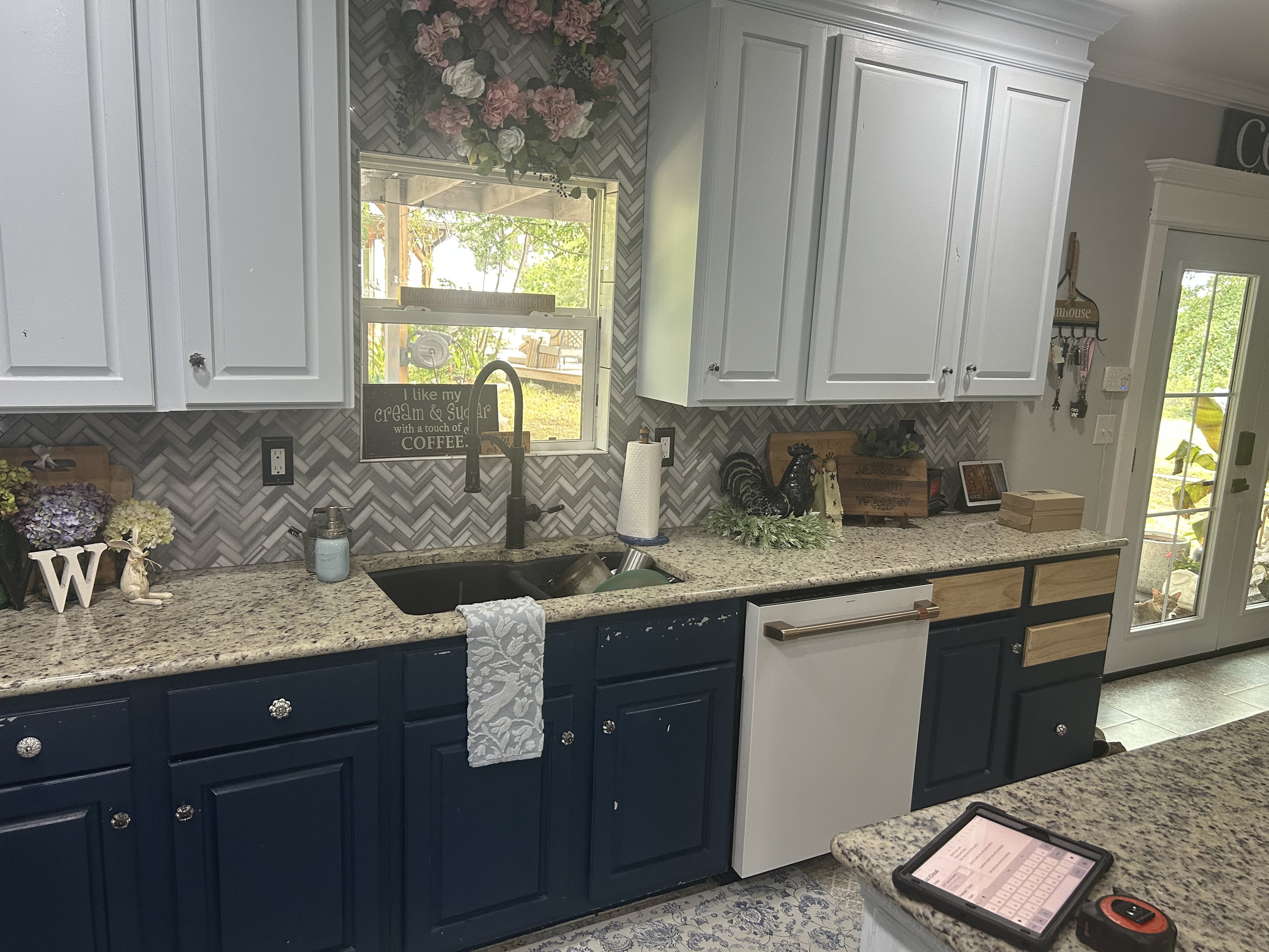 Remodeled Austin kitchen with quartz countertops and custom cabinetry by HN Construction & Remodeling